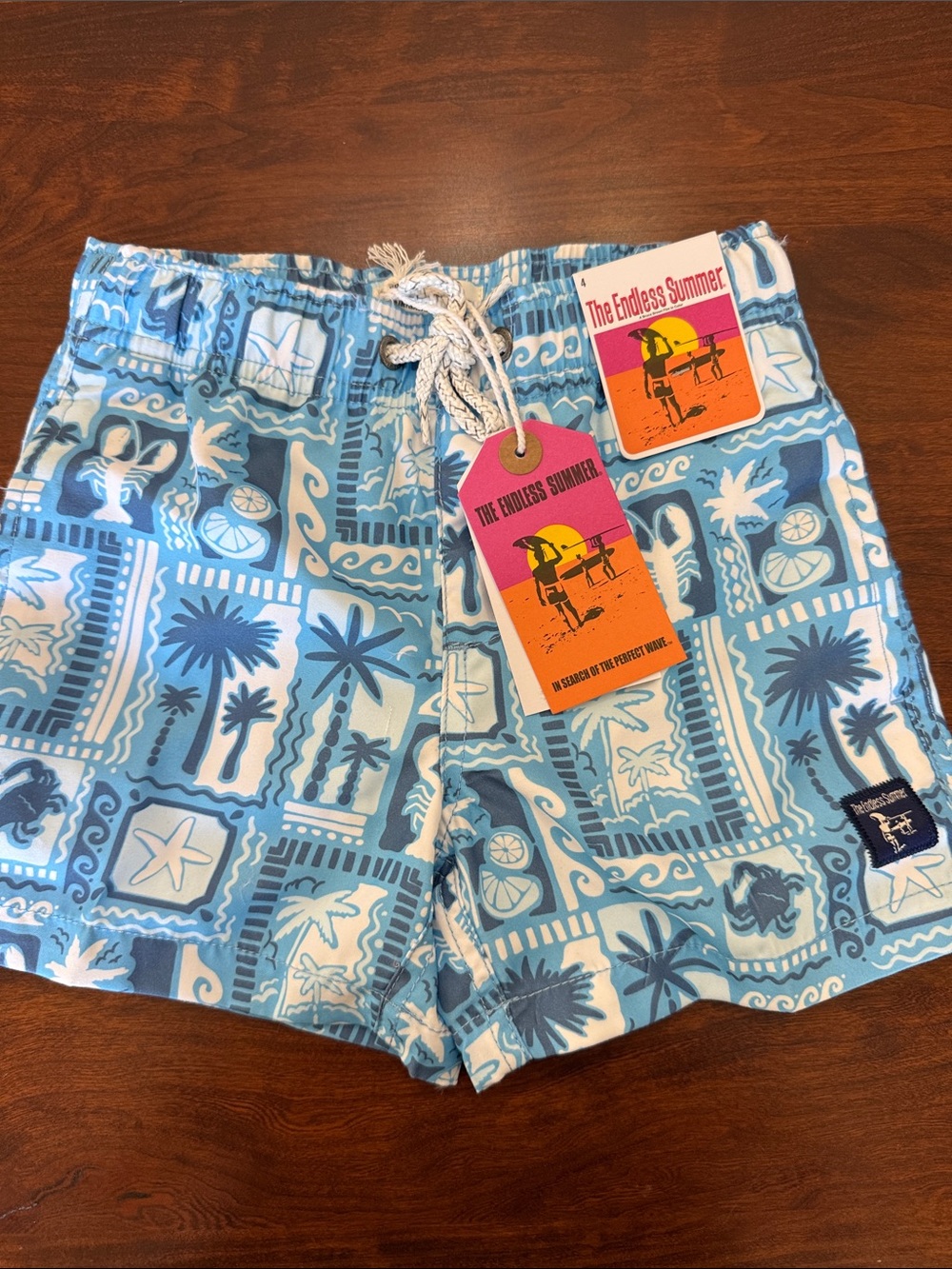 The endless summer boys size 4 little kids palm print volley swim trunks NWT